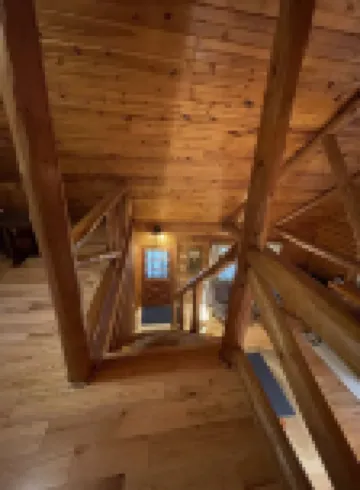 Beautiful log cabin with all the creature comforts of home. Private fishing lake