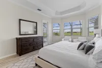 Ave Maria, The National Golf Course, swimming pool and hot tub.