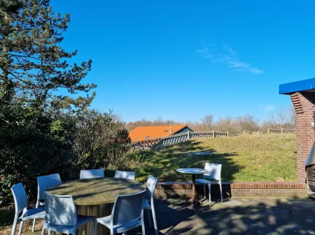 Vacation home for 6 people located directly on the dune Отели в г. Вангероге