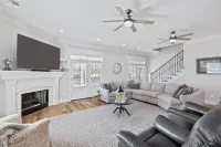 Luxury riverfront home w/ pool, fishing dock, & boat house w/ lift ! Sleeps 14