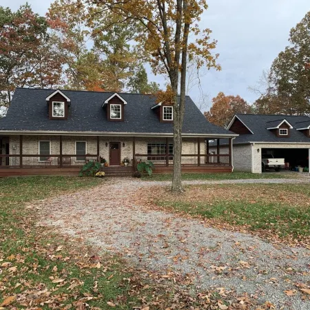 Private brick home in the woods near lake