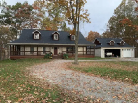 Private brick home in the woods near lake
