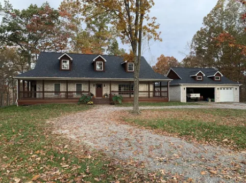 Private brick home in the woods near lake