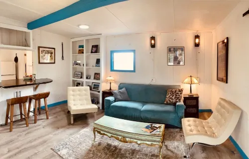 Charming beach cottage in a beautiful garden setting.