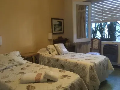 El Jardín Hotel Hoteles cerca de Plazoleta Costanera Norte