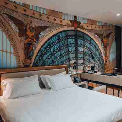 卡魯索廣場精品及養生套房飯店 Rooms
