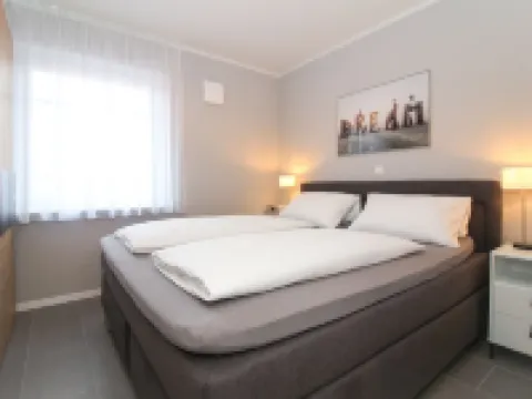 Modern, spacious, comfort apartment on the ground floor for four people and a baby. Hotels in Greetsiel