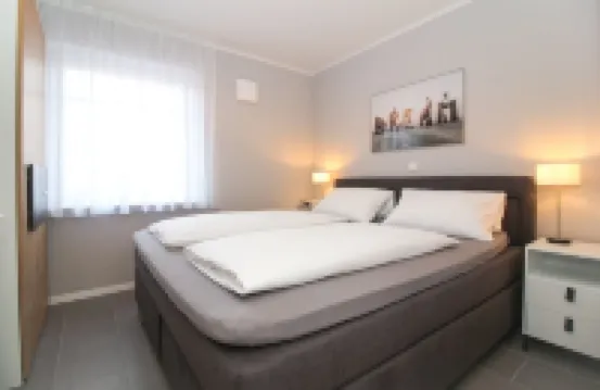 Modern, spacious, comfort apartment on the ground floor for four people and a baby.