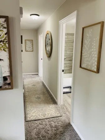 Cheerful 3 bedroom home on wooded acre. Near to Port Huron and Lake Huron.