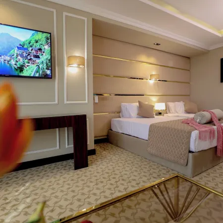 Cairo Taj Mohandessn Hotels & Suites Отели рядом с достопримечательностью «Докки»