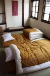 Guesthouse Tomaru Hotels near Hie Shrine
