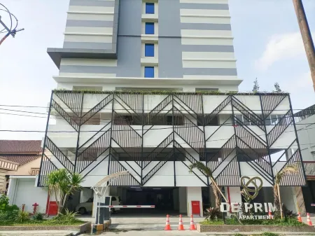 Cozy Studio Room at de Prima Apartment Отели в г. Sei Putih Tengah