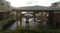 Charming 3/4 apartment with private backyard overlooking the Imbassai Sea