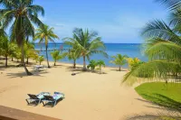 Private, beachfront house on 2.5 acres with fruit trees, owners nextdoor to help
