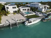 Waterfront Luxury Villa with Optional Boat and Beach Access Just Steps Away