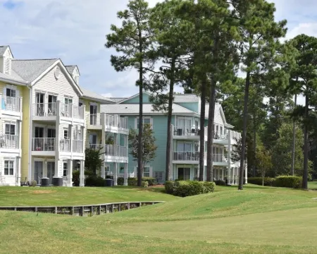 Pool View Unit 1509 at Brunswick Plantation Feature 27 Hole Golf Course Onsite by Redawning Hotels in Calabash