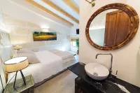 Flor de Mandarina Hoteles en La Puebla