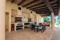 Relajate hermoso jardín y 2 piscinas Hotels in Puerto Aventuras