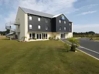 Kyriad Dol de Bretagne Hôtels à : Le Tronchet