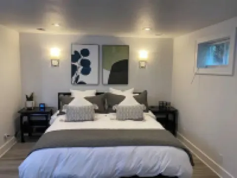 Spacious basement apt. Off-street parking, washer & dryer, kitchenette, sleeps 4