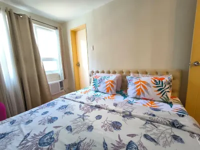 Pool view tropical vibe condo Hotel a Bunawan