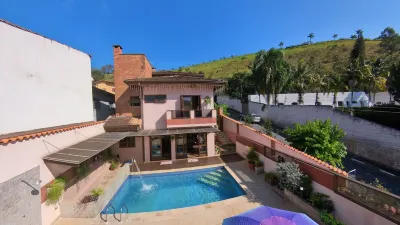 Complete house in the center of Guararema with heated pool! Hotel dekat Parque Municipal Recanto do Americo