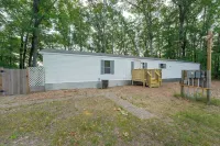Hot Tub + Dock! Lakefront Angler's Oasis in Irons - 4-Star