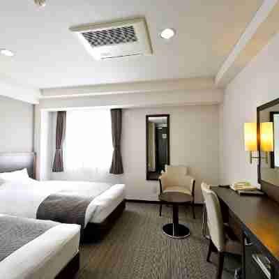 西条アーバンホテル Rooms