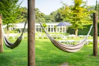Waldhotel Tannenhäuschen Hotel dekat Heimathaus Mussum