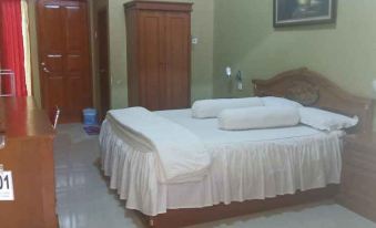 D'Cemara Guesthouse