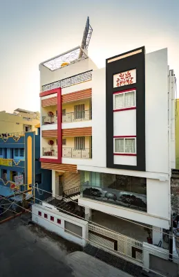 Hotel Signature Inn Hotels near Muthu Silk Plaza