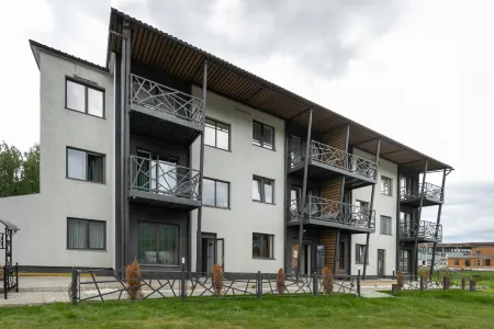 Olga Отели рядом с достопримечательностью «Дом Перевертыш»