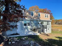 Beautiful home on Lords Point in Stonington CT with lots of parking on large lot