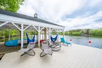 Beautiful and Private 6000 sqft waterfront home with private dock and hot tub!
