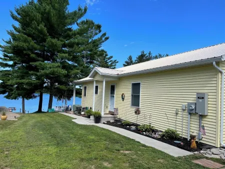 A True Paradise Lake House with Beautiful Sunsets Year Round Direct Trail Access