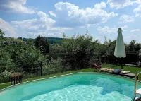 Tasteful and high-quality vacation apartment with large terrace and pool