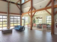 Enjoy sea breezes from double-decker porch -  walk to pool, private waterfront.