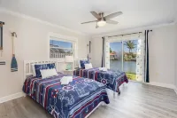 Newly remodeled. Waterfront. 7 min walk from the beach!