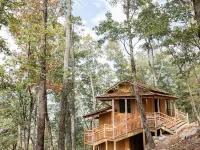 Japanese timberframe tiny house perched on side of Lookout Mountain Hotels in Dade County