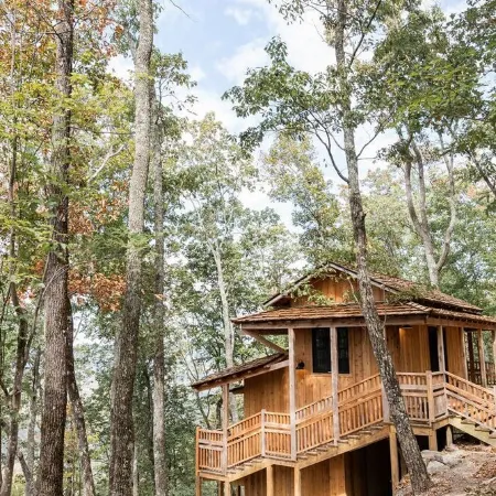 Japanese timberframe tiny house perched on side of Lookout Mountain