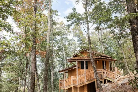 Japanese timberframe tiny house perched on side of Lookout Mountain
