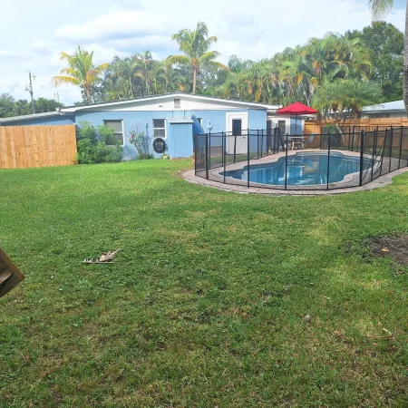 Lagoon shaped pool home with private back yard!