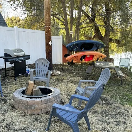 Charming Mountain-View Waterfront Retreat – Hot Tub, Sauna, Game Room & Fire Pit