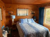 Sunrise Cottage. Relaxing waterfront deck on the rocky shore of Bailey Island.