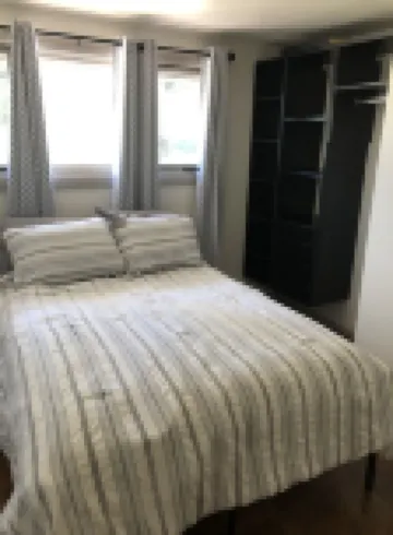 Cozy home next to airport with fenced backyard and lots of sun!