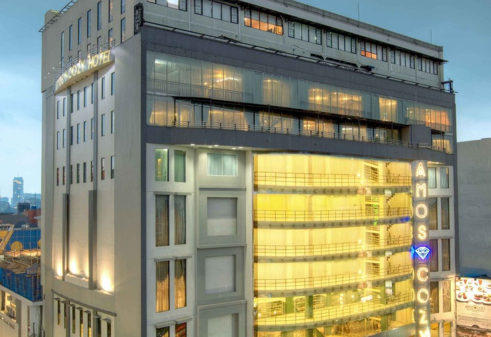 Amos Cozy Hotel MelawaiOver view