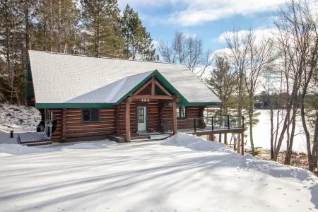 Full Log Home On Private Lake Close To Town, Snowmobile Trails, & Golf Course