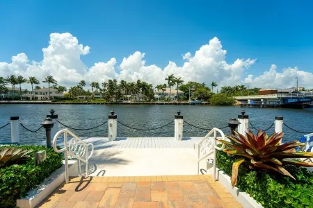 Waterfront Oasis 2BR/2BA with Pool, Gym, Balcony & Parking