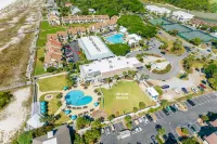 Effortless Beach Access and Resort Amenities - Charming Island Hideaway