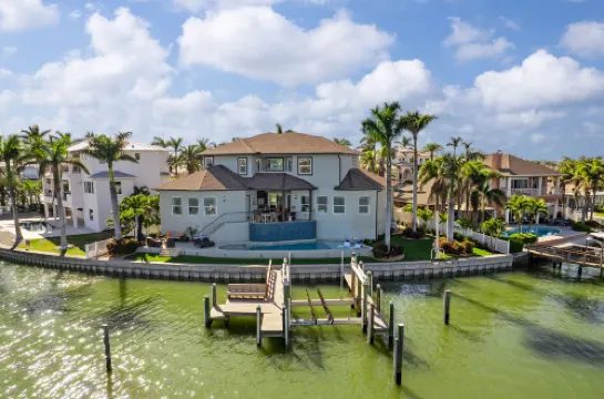 Gorgeous Waterfront Oasis with Heated Pool and Hot Tub - Elegant Retreat